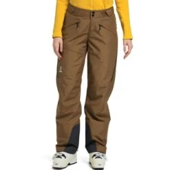 Haglöfs HAGLÖFS LUMI LOOSE PANT WOMEN TEAK BROWN 21 10 Haglöfs HAGLÖFS LUMI LOOSE PANT WOMEN TEAK BROWN 21 -Columbia || Millet || Odlo Verkoopwinkel 9 85865 604625 4la 03